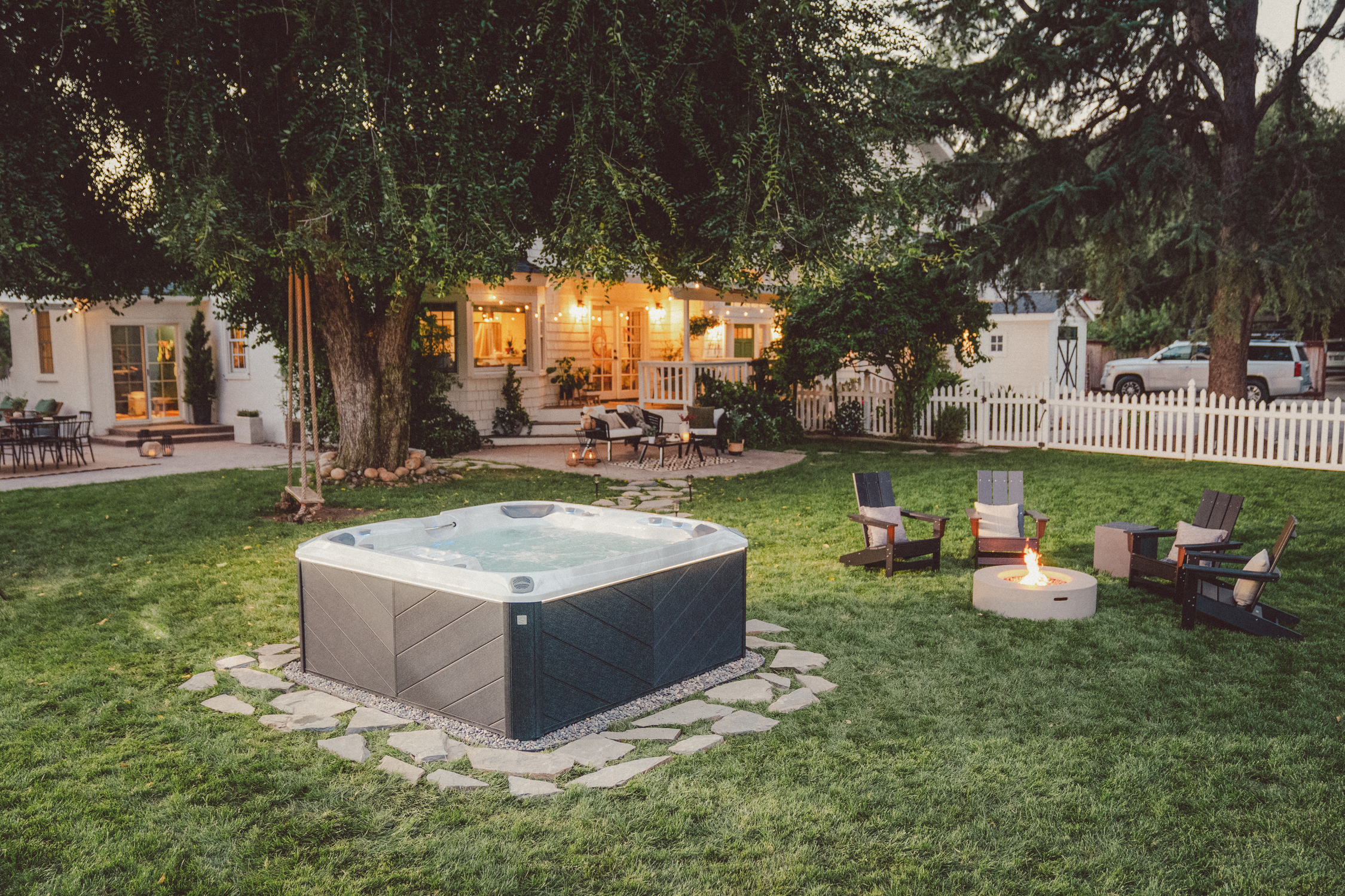 Sundance® Spa sitting in a backyard in uxbridge ontario